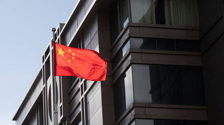 China’s national flag is seen waving at the China Consulate General in Houston, Texas, U.S., July 22, 2020