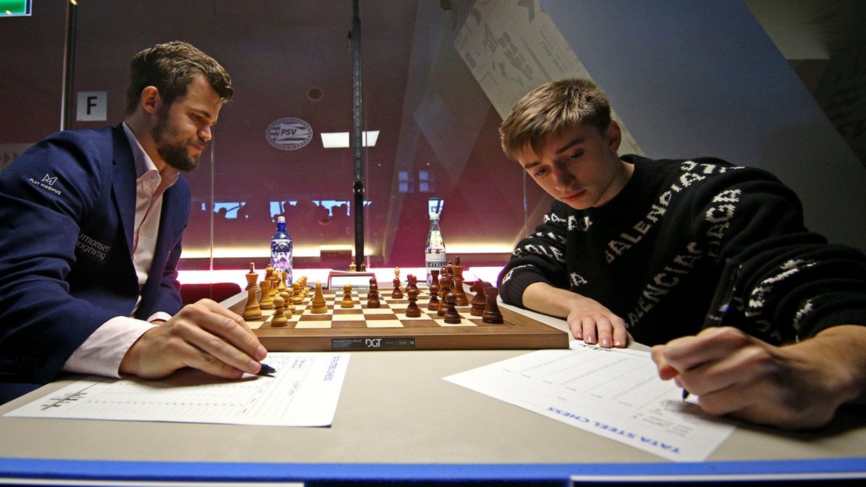 L to R) Bronze medalist Daniil Dubov of Russian , gold medalist Sergey  Karjakin of Russian and silver medalist Magnus Carlsen of Norway pose on  the podium at the medal ceremony for