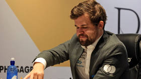 Chess champ Carlsen inches closer to retaining title after Russian rival’s ‘blunder’