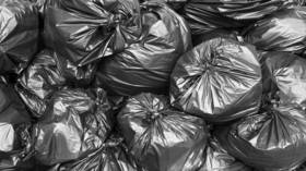 Major British bank fined for laundering trash bags full of cash
