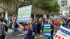 Protesters in 90% vaccinated nation demonstrate against Covid-19 curbs