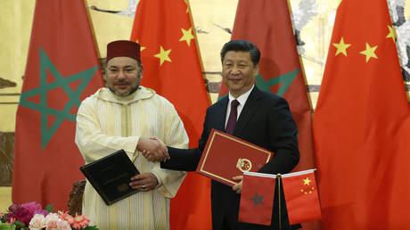 FILE PHOTO. China's President Xi Jinping (R) and Moroccan King, Mohammed VI. © AFP / Kim Kyung-Hoon