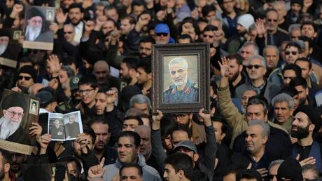 FILE PHOTO. People gather to stage a protest against the killing of Iranian Revolutionary Guards' Quds Force commander Qasem Soleimani in Tehran, Iran. © Getty Images / Fatemeh Bahrami