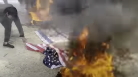 Protesters mourn assassinated general by burning US flags