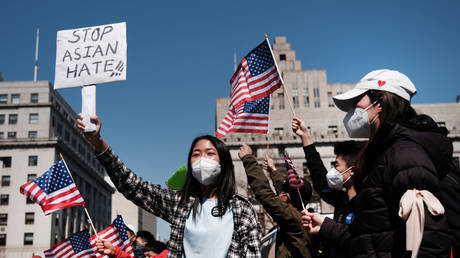 People participate in a protest to demand an end to anti-Asian violence on April 04, 2021 in New York City