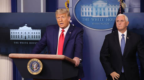 FILE PHOTO. Donald Trump and Mike Pence.