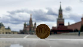 Ruble strengthens as Macron visit signals easing of Ukraine tensions