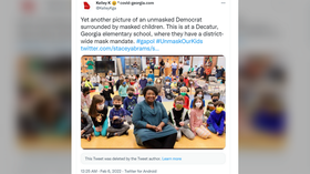 High-profile US Democrat apologizes for maskless school photo