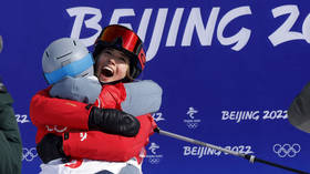 Skier who swapped US for China surges to second Beijing medal