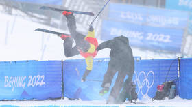 Olympic skier crashes into cameraman (PHOTOS)