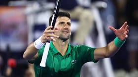 Djokovic wins comfortably in Dubai comeback