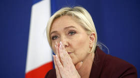 Le Pen suspends presidential bid