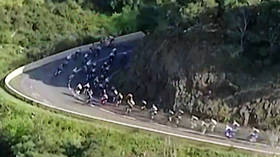 Cyclist falls off cliff over wall in terrifying crash (VIDEO)