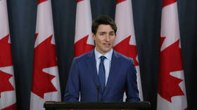 Trudeau strikes deal to remain in power