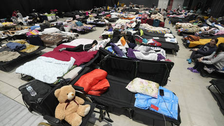 Ukrainian refugees settle at a refugee center at Global Expo in Warsaw, Poland on April 2, 2022.