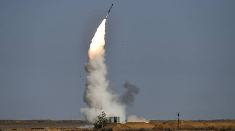 FILE PHOTO: A S-400 surface-to-air missile system fires during drills at the Ashuluk training range, in the Astrakhan region, Russia, November 22, 2020.