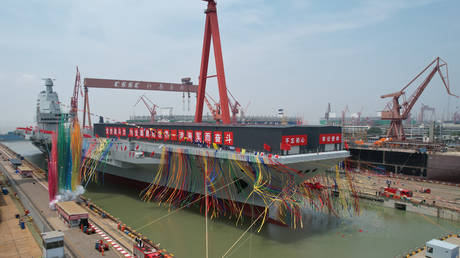 Chinese newly launched aircraft carrier 'Fujian' is seen in Shanghai, China, on June 17, 2022.