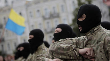 Volunteers take an oath of allegiance to Ukraine, before being sent to the eastern part of Ukraine to join the ranks of special battalion "Azov" in Kiev, Ukraine, Monday, June 23, 2014.