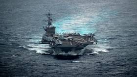 US told to 'stop stirring trouble' at sea