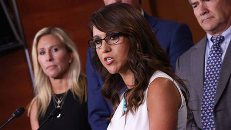 US Representatives Marjorie Taylor Greene (left) and Lauren Boebert are shown at a June 2021 press conference in Washington.