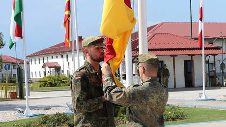 The German military contingent officially welcomed to Camp Butmir with a flag raising ceremony at EUFOR HQ, August 16, 2022