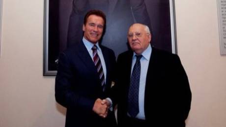 FILE PHOTO: Austrian-American actor and former governor Arnold Schwarzenegger (L) is seen with ex-Soviet leader Mikhail Gorbachev.