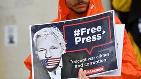 Australian parliament seized books on Assange, family says