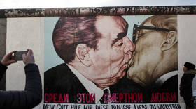 Artist behind iconic Berlin Wall mural dies at 62