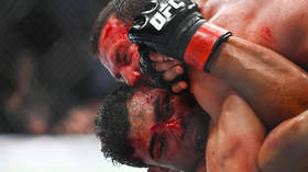 UFC star smears blood across rival’s face in gruesome act (VIDEO)