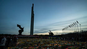 Latvia detains protesters after destruction of Soviet monument