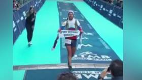 Italian ultramarathon runner shows support for banned Russians