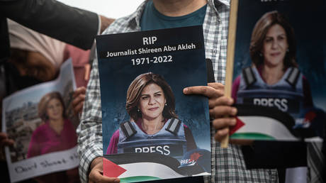 Tributes are paid to murdered Palestinian journalist Shireen Abu Akleh at a protest and vigil at BBC Broadcasting House on May 12, 2022 in London, England.