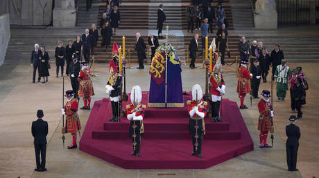 Members of the public pay their respects as the vigil begins around the coffin of Queen Elizabeth II in Westminster Hall, London, September 14, 2022