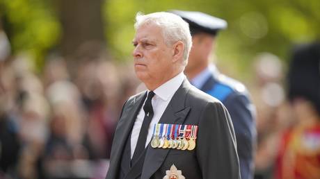 Prince Andrew follows the coffin of Queen Elizabeth II during a procession from Buckingham Palace to Westminster Hall in London, Britain, September 14, 2022