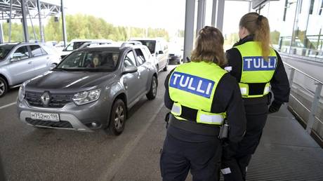 FILE PHOTO: Finnish customs officers check a Russian vehicle at a border crossing in Virolahti, Finland, on September 25, 2022.