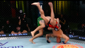 UFC fighter breaks Octagon canvas with savage takedown (VIDEO)