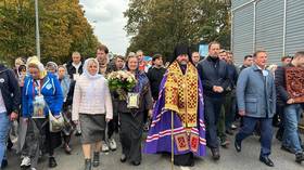 Cross procession commemorates Russian Emperor