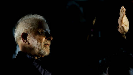 Brazilian former President (2003-2010) and candidate for the leftist Workers Party (PT) Luiz Inacio Lula da Silva waves to supporters after learning the results of the legislative and presidential election, in Sao Paulo, Brazil, on October 2, 2022.