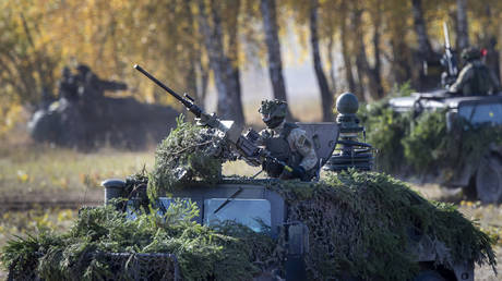 FILE PHOTO: Lithuanian Armed Forces hold a military exercise some 130 kilometers west of the capital Vilnius, Lithuania, October 10, 2022