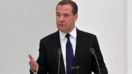 Former Russian President Dmitry Medvedev speaks during a meeting with members of the Security Council in Moscow on February 21, 2022.