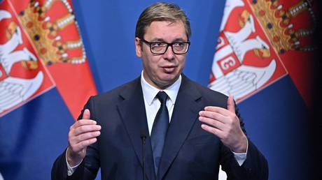 Serbian President Aleksandar Vucic attends a press conference with the Hungarian prime minister and the Austrian chancellor in Budapest on October 3, 2022.