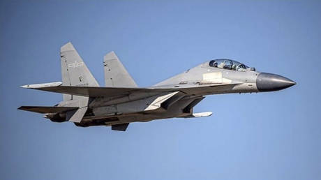 FILE PHOTO: A Chinese PLA J-16 fighter jet flies in an undisclosed location, June 2021