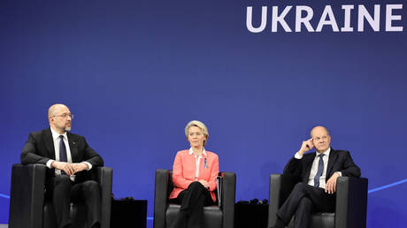 Ukrainian Prime Minister Denys Shmyhal, EU Commision President Ursula von der Leyen and German Chancellor Olaf Scholz sit at a conference for reconstruction of Ukraine in Berlin, Germany, on October 25, 2022.