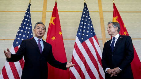 US Secretary of State Antony Blinken and China's Foreign Minister Wang Yi attend a meeting in Nusa Dua on the Indonesian island of Bali on July 9, 2022.