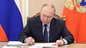Putin signs unification treaties for new Russian regions