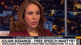 Assange’s wife spars with John Bolton