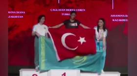 Bizarre flag row breaks out between female armwrestlers (VIDEO)