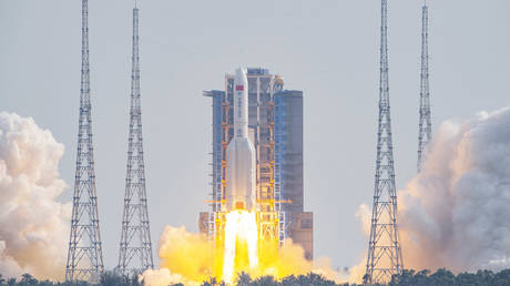 A Long March 5B rocket, carrying China's Mengtian science module lifts off from the Wenchang space launch center.