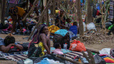 FILE PHOTO: More than 12,000 Haitian migrants set up a makeshift encampment under the international bridge in Del Rio, Texas, hoping to enter the US; September 21, 2021.