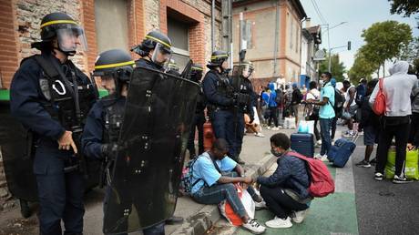 French National Police evacuate migrants from a squat in the city of Toulouse, France, August 26, 2022